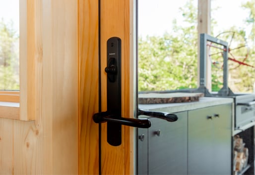 Single-panel E-Series Hinged Patio Door with black Albany hardware
