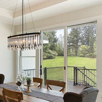 image of dining room with andersen white framed sliding patio door