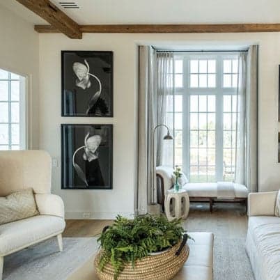 interior view of Livingroom with andersen white framed windows with grilles